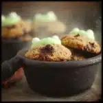 Freshly baked Cauldron Cookies on a rustic plate