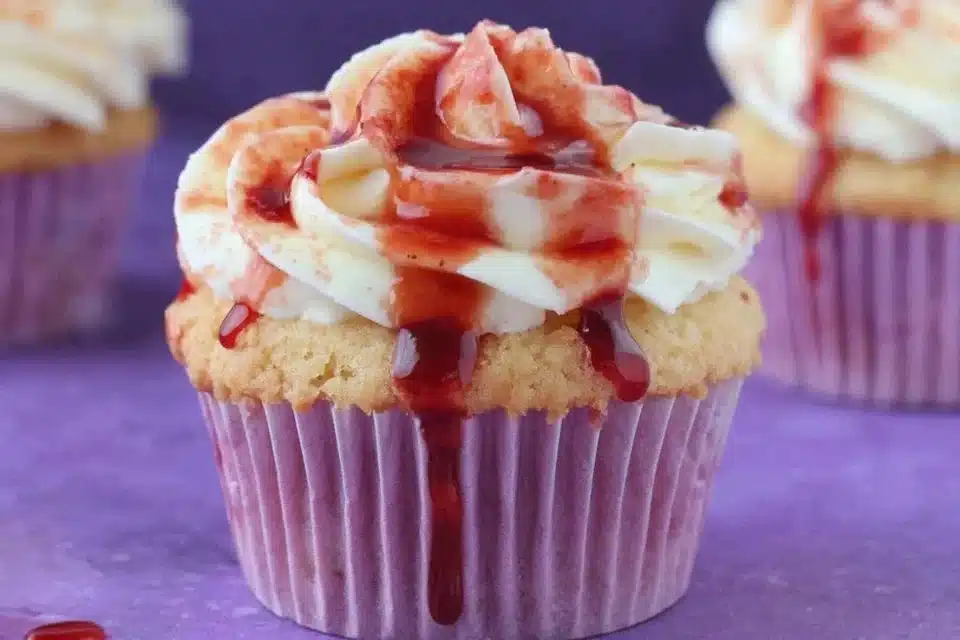 Chocolate cupcakes filled with pumpkin cheesecake, a festive dessert delight.