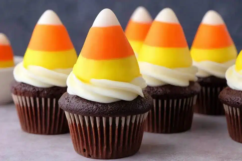 Easy Halloween candy corn cupcakes decorated for a festive celebration
