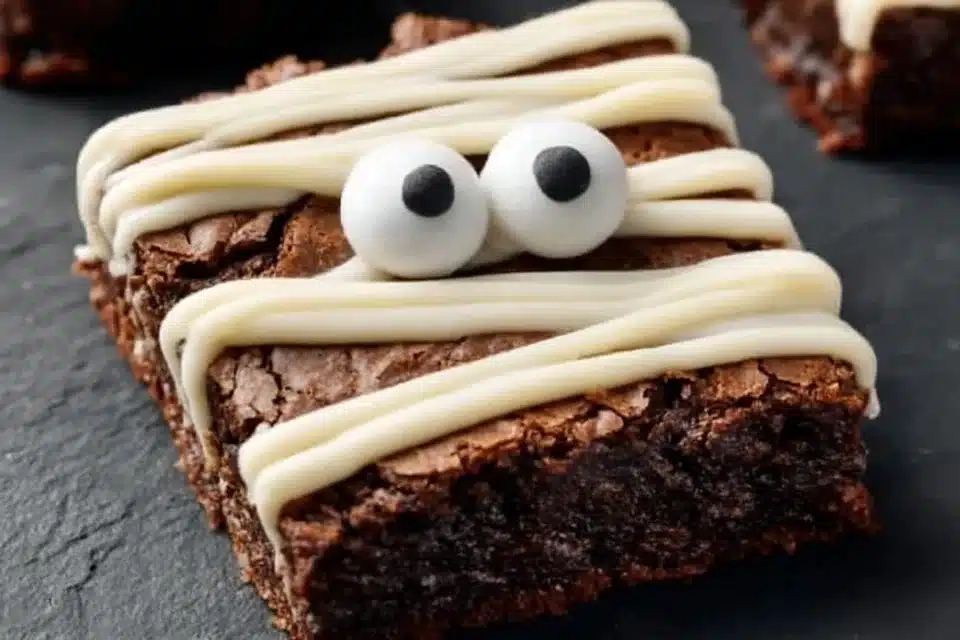 Easy Halloween Mummy Brownies with Cream Cheese Frosting: A Spooky Delight for All Ages 4 Easy Halloween Mummy Brownies with cream cheese frosting decorated for spooky fun