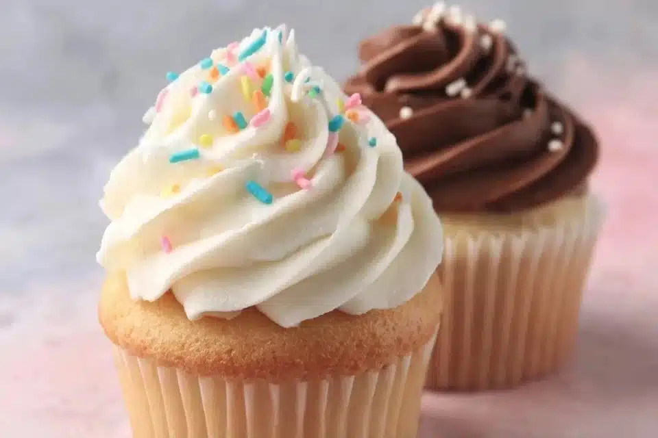 Easy mini vanilla and chocolate cupcakes arranged on a platter