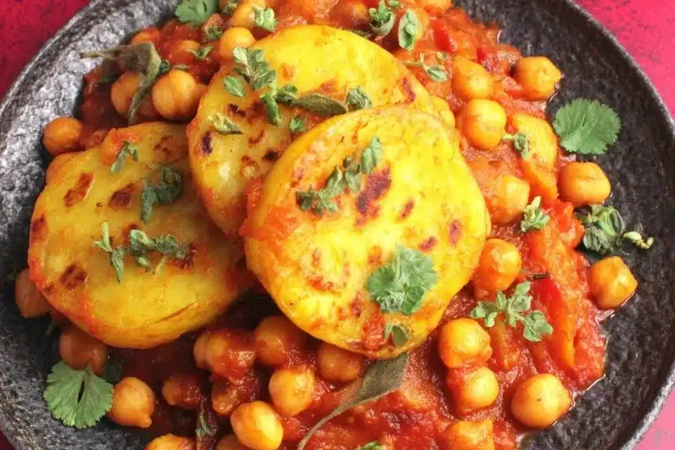 Easy Vegan Potato Curry 4 Bowl of easy vegan potato curry with vibrant spices and vegetables