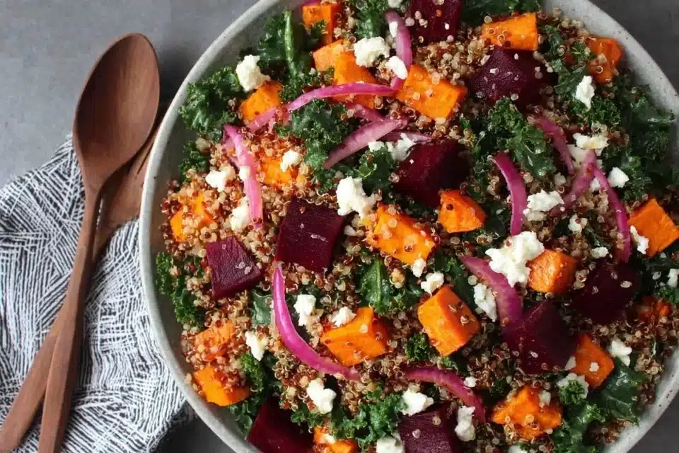 Roasted sweet potato beet salad with quinoa and feta in a bowl