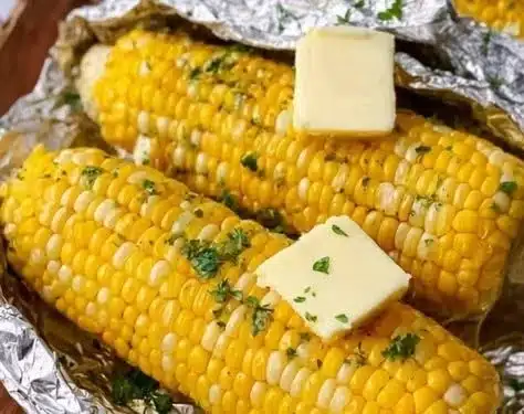 Grilled corn on the cob serving on a barbecue grill