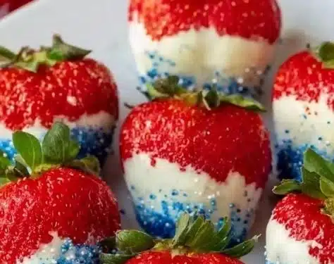 Strawberries topped with marshmallow creme and colorful sprinkles