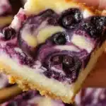 Blueberry Ripple Cheesecake Bars Recipe 3 blueberry ripple cheesecake bars recipe 2026 07 08 212729 1